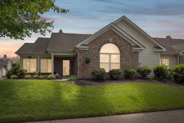 825 S Browns Ln Unit 1501, Gallatin, TN 37066 - single story home with a lawn, brick siding, roof with shingles, and a chimney