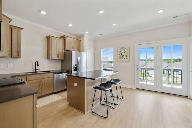 362 Savoy Loop, Nolensville, TN 37135 - kitchen with appliances with stainless steel finishes, a sink, dark countertops, a kitchen breakfast bar, and a center island