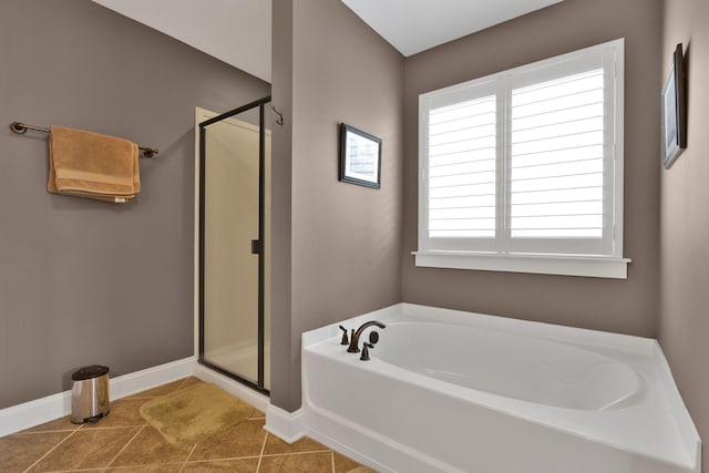 606 Tywater Crossing Blvd, Franklin, TN 37064 - bathroom featuring a bath, a shower stall, and baseboards
