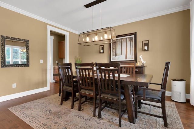 606 Tywater Crossing Blvd, Franklin, TN 37064 - dining space with baseboards, crown molding, and wood finished floors