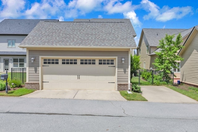 606 Tywater Crossing Blvd, Franklin, TN 37064 - view of front of house featuring brick siding, concrete driveway, a garage, and a shingled roof