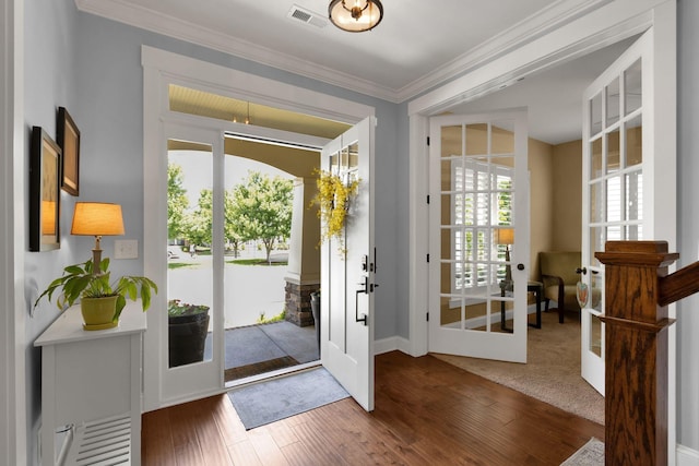 606 Tywater Crossing Blvd, Franklin, TN 37064 - foyer entrance featuring wood finished floors, crown molding, and baseboards