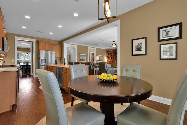 606 Tywater Crossing Blvd, Franklin, TN 37064 - dining space with baseboards, dark wood-type flooring, ceiling fan, recessed lighting, and ornamental molding