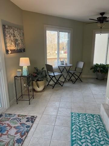 2926 Lisa Dr, Springfield, TN 37172 - living area featuring light tile patterned flooring, a ceiling fan, and baseboards
