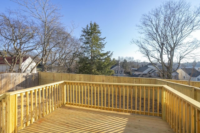 507 Demoss St Unit 110, Gallatin, TN 37066 - wooden terrace with a fenced backyard and a residential view