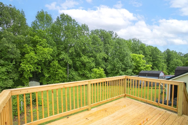 1011 Bon Meade Dr, Burns, TN 37029 - deck with a storage shed, an outdoor structure, and a yard