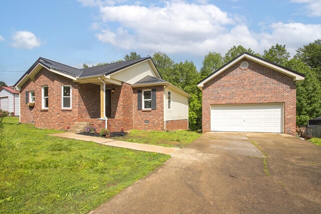 1011 Bon Meade Dr, Burns, TN 37029 - view of front of home with brick siding, a garage, a front yard, metal roof, and concrete driveway