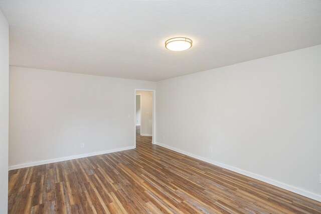 1011 Bon Meade Dr, Burns, TN 37029 - unfurnished room featuring wood finished floors and baseboards