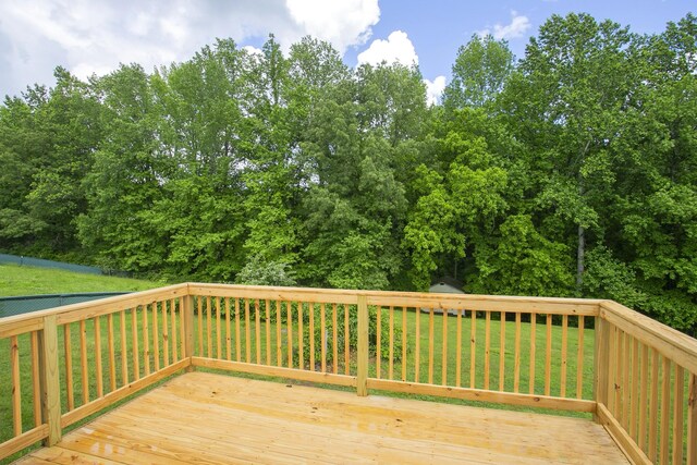 1011 Bon Meade Dr, Burns, TN 37029 - wooden deck featuring a yard and view of scattered trees
