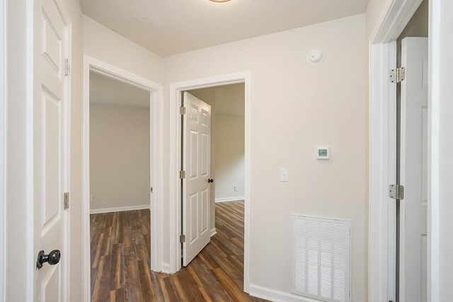 1011 Bon Meade Dr, Burns, TN 37029 - hallway with dark wood finished floors and baseboards