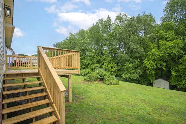 1011 Bon Meade Dr, Burns, TN 37029 - view of green lawn featuring stairs, a shed, a deck, and an outdoor structure