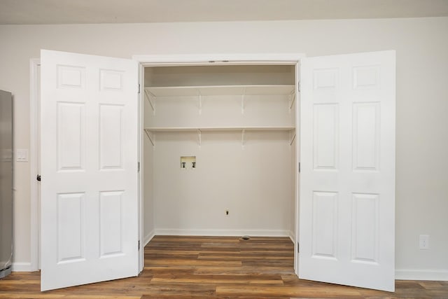 1011 Bon Meade Dr, Burns, TN 37029 - laundry room with dark wood finished floors, hookup for a washing machine, and baseboards