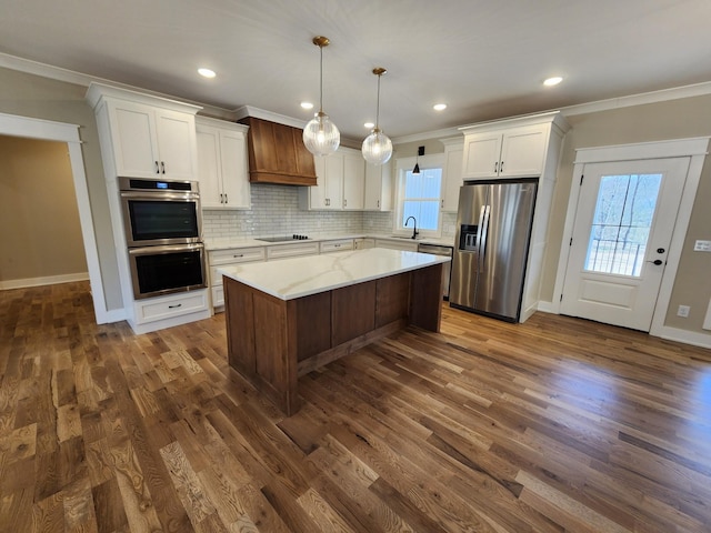 240 S Tunnel Rd, Portland, TN 37148 - kitchen with appliances with stainless steel finishes, a sink, crown molding, baseboards, and white cabinetry