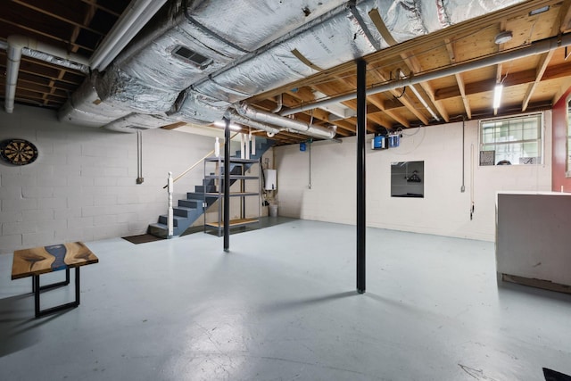 114 Clover Dr, Columbia, TN 38401 - basement featuring stairway and concrete block wall