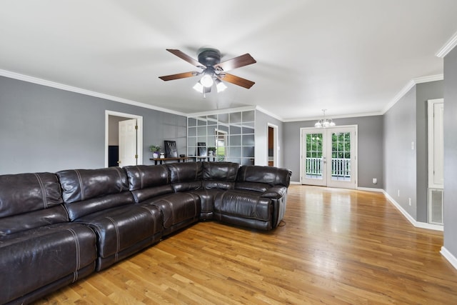 114 Clover Dr, Columbia, TN 38401 - living room with light wood finished floors, ceiling fan, ornamental molding, baseboards, and a chandelier