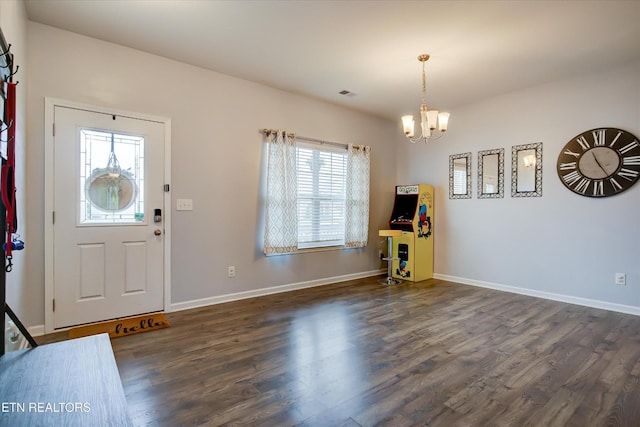 1242 Bill Wallace Dr, Friendsville, TN 37737 - foyer featuring a chandelier, dark wood-style floors, and baseboards