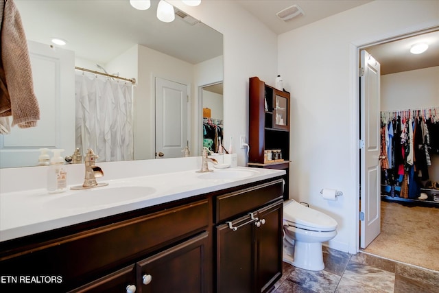 1242 Bill Wallace Dr, Friendsville, TN 37737 - full bath with toilet, double vanity, a spacious closet, and curtained shower