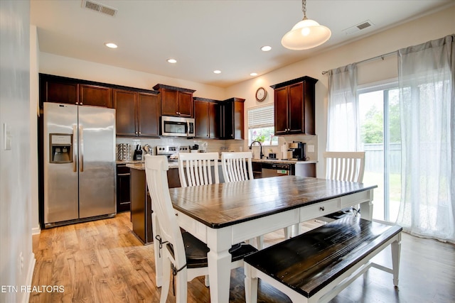 1242 Bill Wallace Dr, Friendsville, TN 37737 - dining space featuring light wood-type flooring and recessed lighting