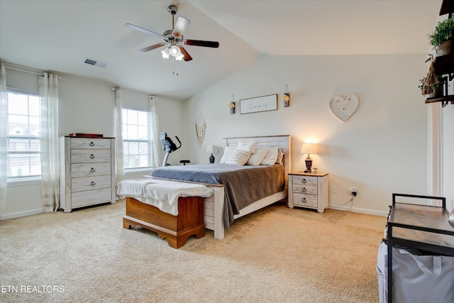 1242 Bill Wallace Dr, Friendsville, TN 37737 - bedroom with light carpet, vaulted ceiling, baseboards, and a ceiling fan