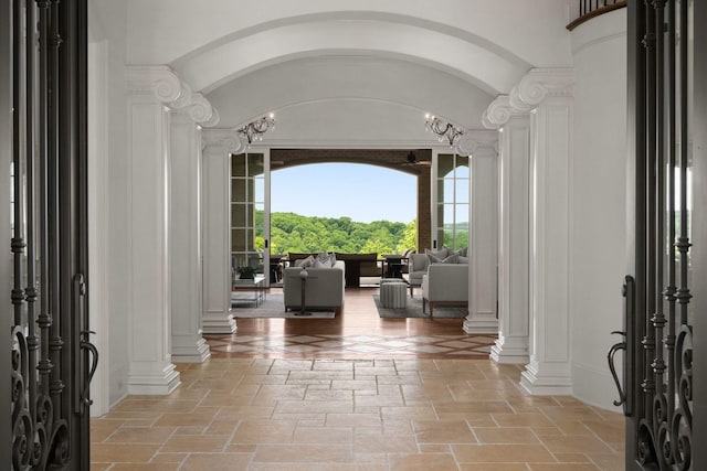 443 Canterbury Rise, Franklin, TN 37067 - entryway with stone tile flooring and ornate columns