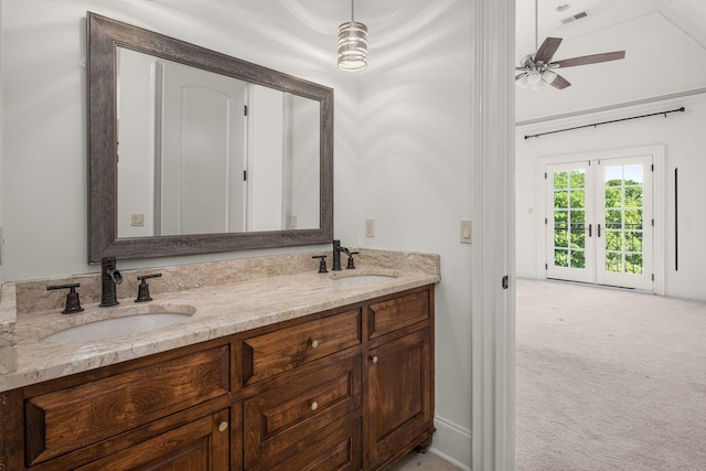 443 Canterbury Rise, Franklin, TN 37067 - bathroom featuring double vanity, a ceiling fan, vaulted ceiling, and french doors