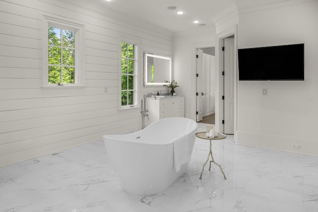 443 Canterbury Rise, Franklin, TN 37067 - bathroom with a soaking tub, marble finish floors, vanity, recessed lighting, and crown molding