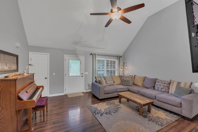 living area featuring lofted ceiling, a ceiling fan, wood finished floors, and baseboards