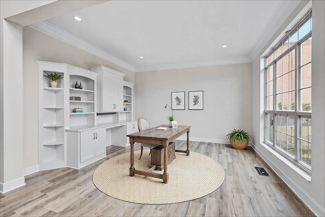 513 Leicester Ct, Franklin, TN 37067 - dining area featuring healthy amount of natural light, light wood-type flooring, ornamental molding, recessed lighting, and built in study area