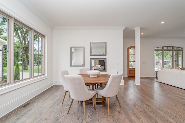 909 Gale Ln Unit A, Nashville, TN 37204 - dining area featuring crown molding, plenty of natural light, baseboards, arched walkways, and recessed lighting