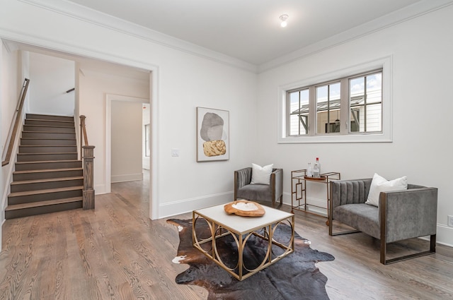 909 Gale Ln Unit A, Nashville, TN 37204 - living area featuring crown molding, stairway, wood finished floors, and baseboards