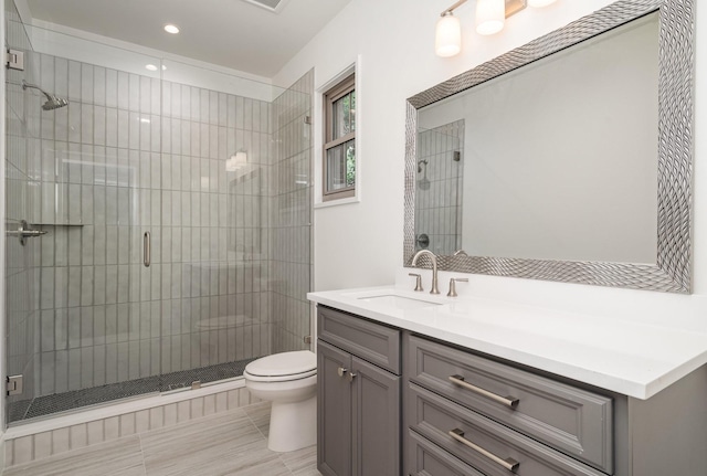 909 Gale Ln Unit A, Nashville, TN 37204 - bathroom with toilet, a stall shower, vanity, and recessed lighting