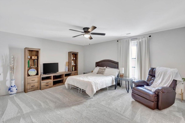 bedroom featuring carpet and ceiling fan