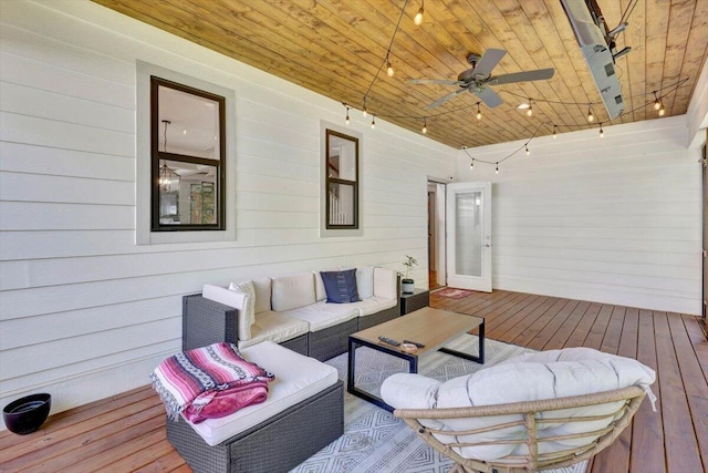 deck featuring an outdoor hangout area and a ceiling fan