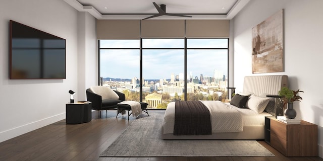 bedroom with a skyline view, dark wood-type flooring, baseboards, floor to ceiling windows, and recessed lighting