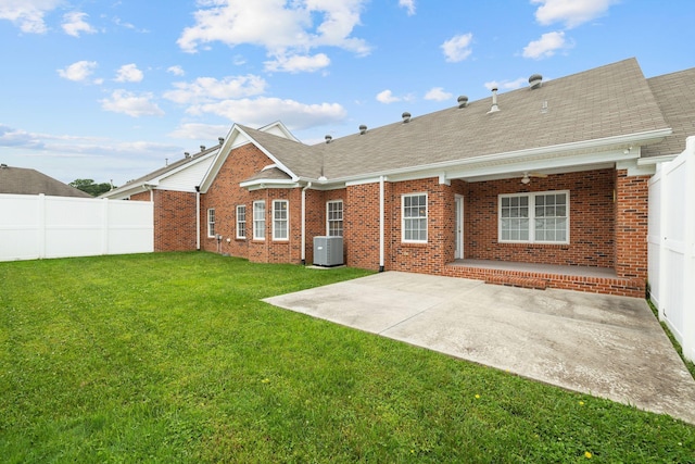 153 Magnolia Glen Cir, Manchester, TN 37355 - back of house featuring brick siding, a patio, a shingled roof, and cooling unit