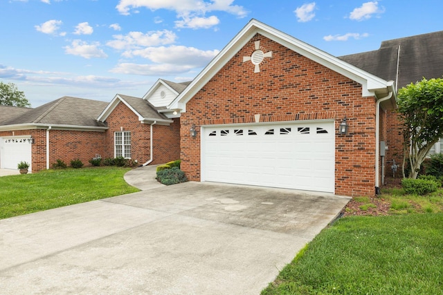 153 Magnolia Glen Cir, Manchester, TN 37355 - view of front facade with a garage, brick siding, driveway, a front yard, and a shingled roof