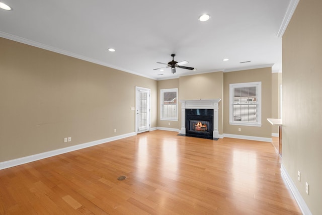 153 Magnolia Glen Cir, Manchester, TN 37355 - unfurnished living room with a ceiling fan, light wood-style floors, a high end fireplace, baseboards, and recessed lighting