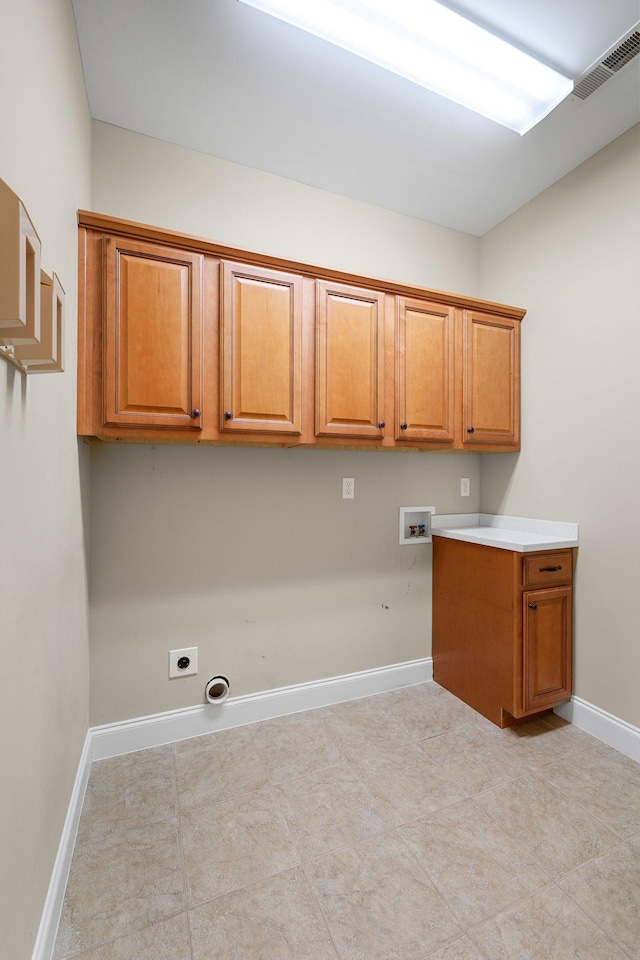 153 Magnolia Glen Cir, Manchester, TN 37355 - clothes washing area featuring cabinet space, washer hookup, baseboards, and electric dryer hookup
