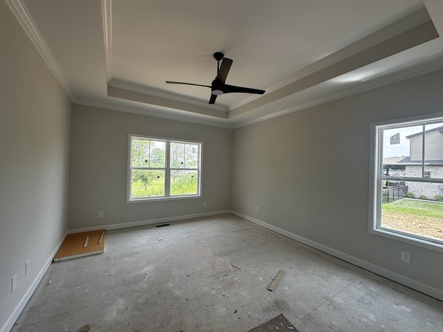 1067 Robert Lee Dr, Gallatin, TN 37066 - empty room with a tray ceiling, ornamental molding, baseboards, and a ceiling fan