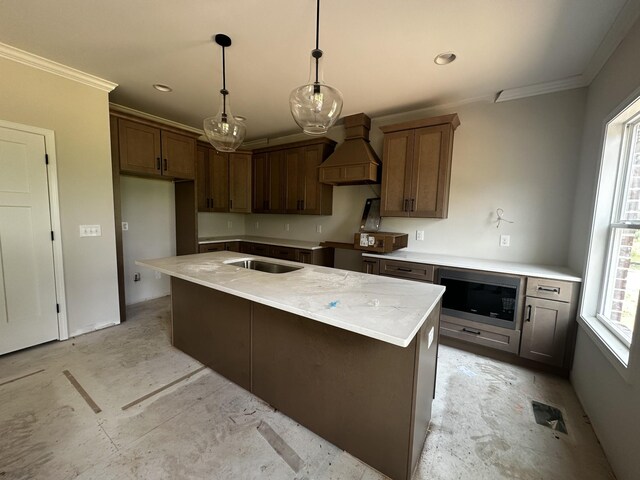 1067 Robert Lee Dr, Gallatin, TN 37066 - kitchen featuring custom exhaust hood, stainless steel microwave, crown molding, a sink, and hanging light fixtures