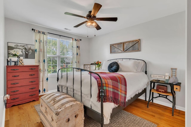 213 Hickory Trl, White House, TN 37188 - bedroom with wood finished floors, baseboards, and ceiling fan