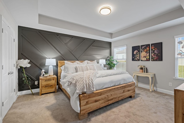 5902 Covent Ln, Smyrna, TN 37167 - bedroom featuring carpet floors, baseboards, a decorative wall, and a tray ceiling