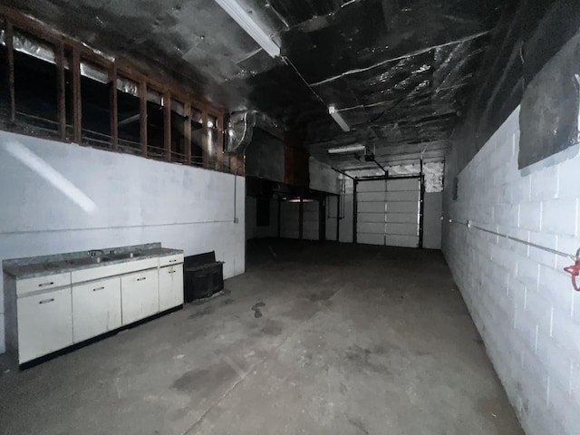 555 Oakley Allons Rd, Allons, TN 38541 - garage featuring concrete block wall