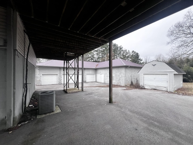 555 Oakley Allons Rd, Allons, TN 38541 - view of patio / terrace with central air condition unit and an outbuilding