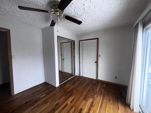 555 Oakley Allons Rd, Allons, TN 38541 - unfurnished bedroom featuring wood finished floors, a textured ceiling, ceiling fan, and a closet