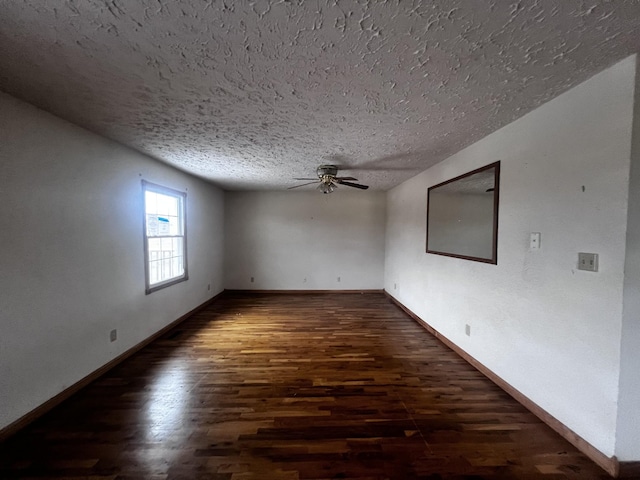 555 Oakley Allons Rd, Allons, TN 38541 - empty room with a ceiling fan, dark wood-style flooring, a textured ceiling, and baseboards