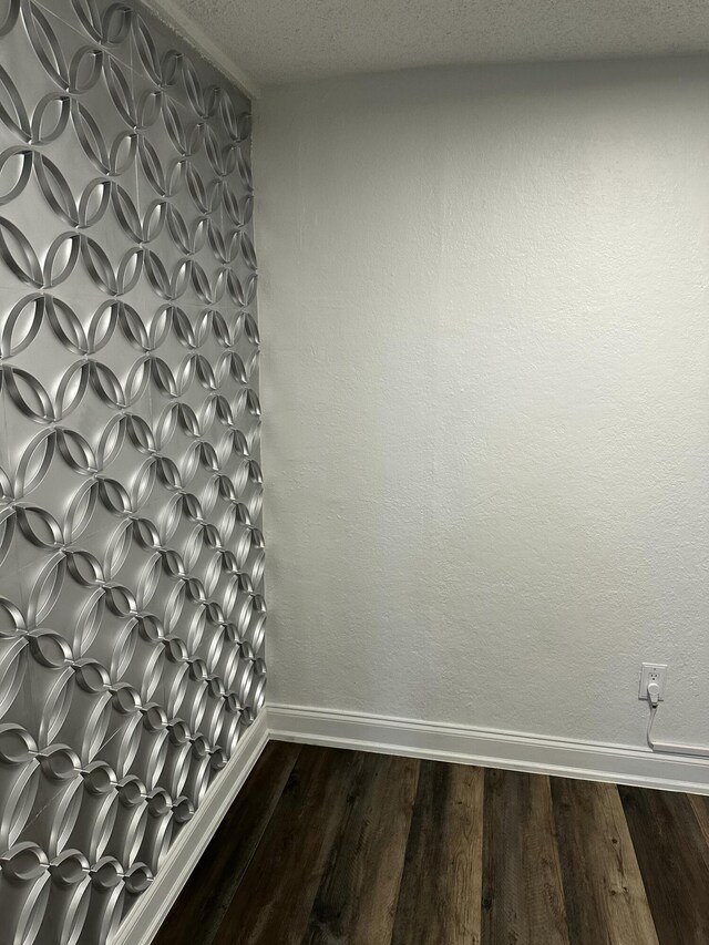 2514 Maplewood Dr, Chattanooga, TN 37421 - empty room with dark wood-type flooring and baseboards