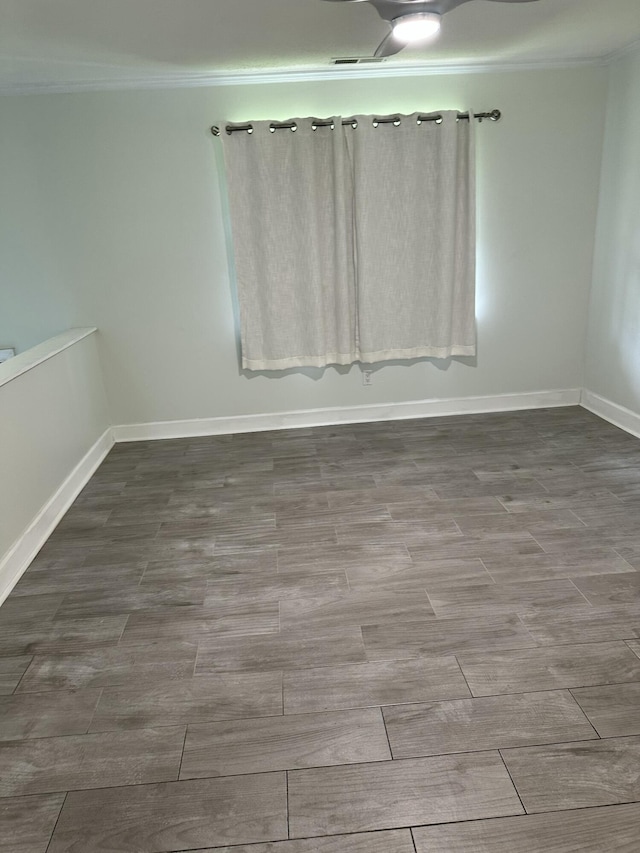 2514 Maplewood Dr, Chattanooga, TN 37421 - unfurnished room featuring crown molding, baseboards, and wood finished floors