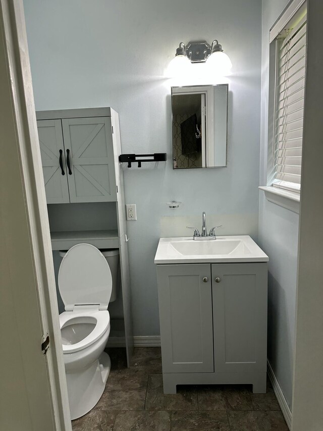 2514 Maplewood Dr, Chattanooga, TN 37421 - bathroom with vanity, baseboards, and toilet