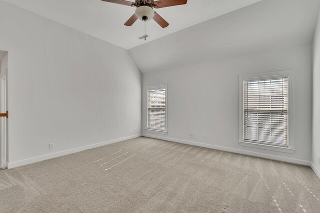 3033 Tybee Trl, Murfreesboro, TN 37127 - carpeted empty room featuring plenty of natural light, ceiling fan, lofted ceiling, and baseboards